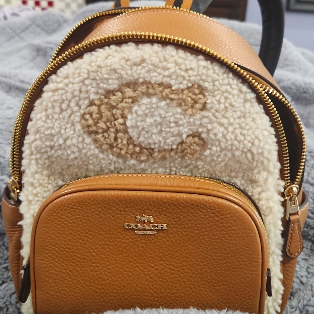 Coach court backpack with Coach motif